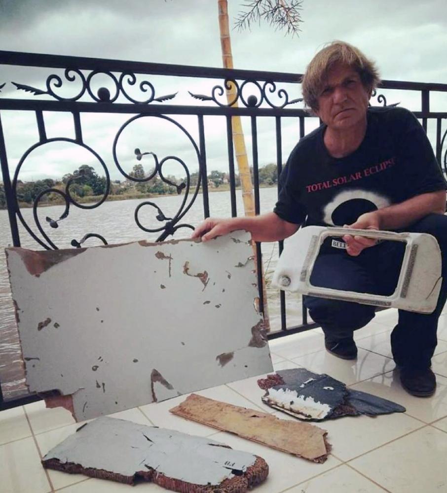 Mr Gibson with some of the MH370 debris