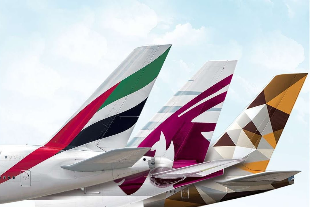 Which airline, Qatar, Emirates, or Etihad, offers the most legroom in Economy class?